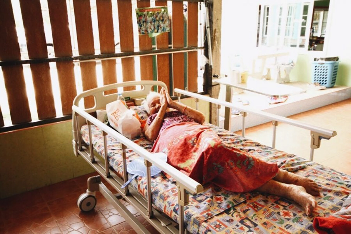 QNET staff visiting elders