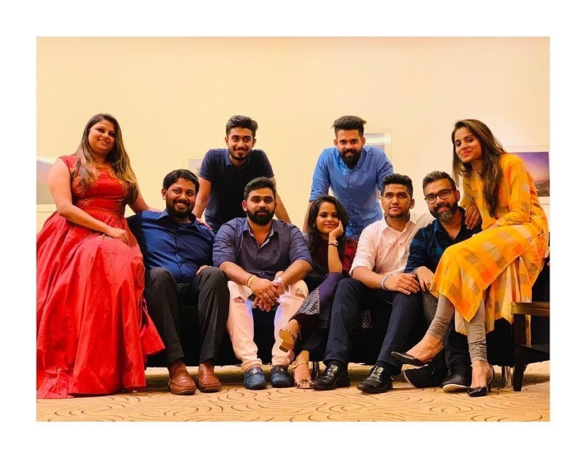 Abid Pottayil posing with team and family