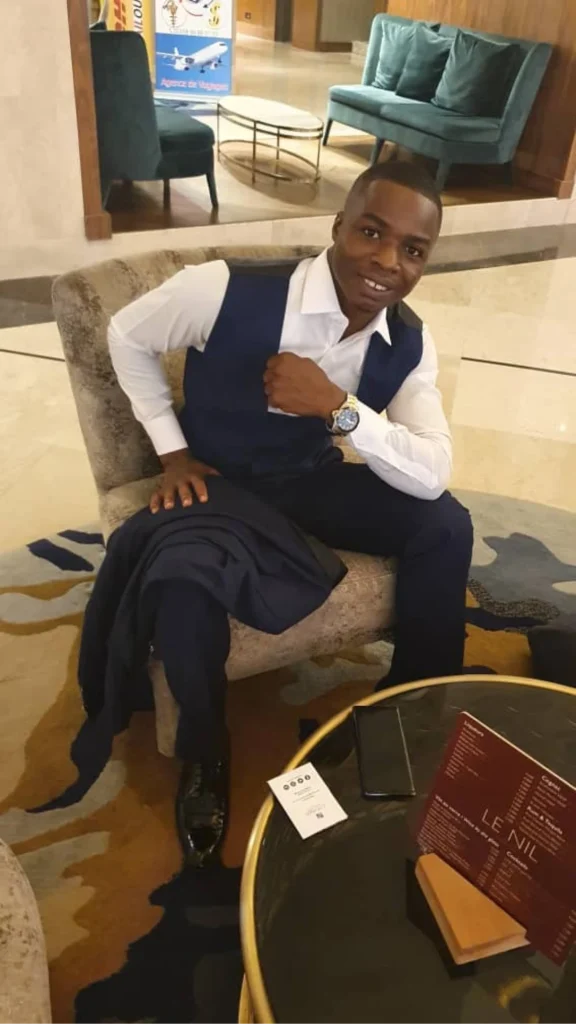 Platinum Star Houffoue Yao Hyacinthe Shares His Direct Selling Success Tips 4 Houffoue Yao Hyacinthe sitting in a hotel lobby at event