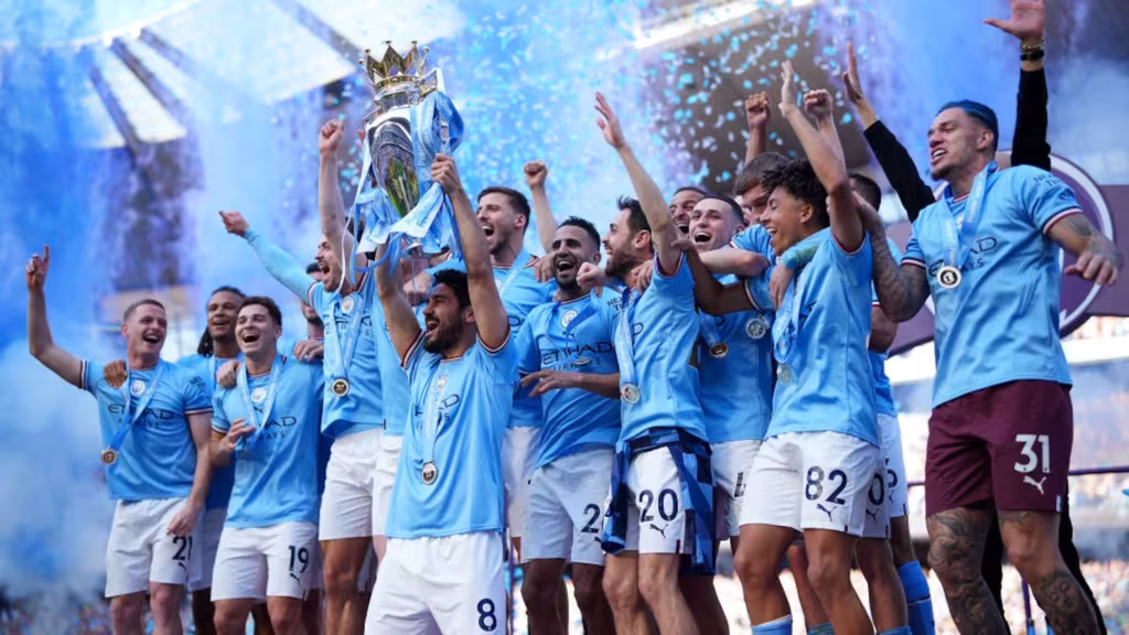 Why The English Premier League Is Still On Top After 30 Years 2 QNET-ManCity Celebrating with their 2023 English Premier League trophy