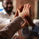 Direct selling industry professionals joining hands