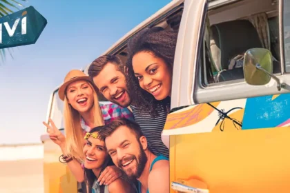 Members of the QVI Club peek out of their van