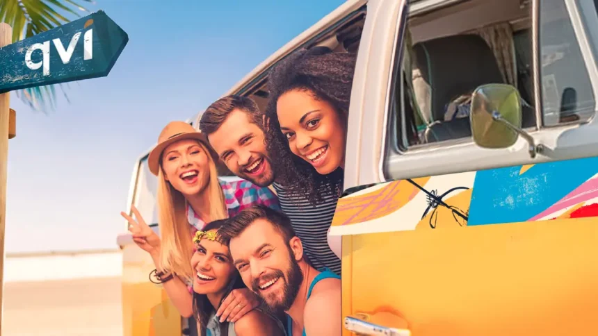 Members of the QVI Club peek out of their van