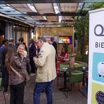 QNET South America banner welcomes guests to the soft launch in Argentina