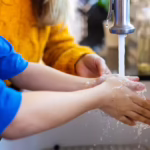 Why home water quality matters | Boy washing hands